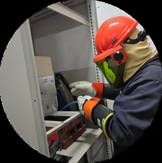 Technician with face shield measuring