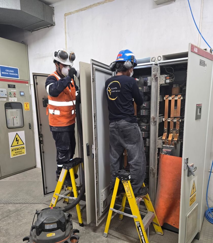AYAHR crew working on an open switchboard
